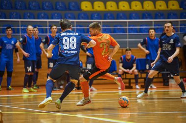 KHARKIV, UKRAINE - 24 Ocak 2021 Ukrayna ExtraLeague Viva Cup Monolit Donbass Energo Trading 'e karşı futsal maçı