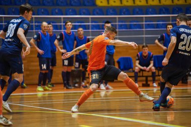 KHARKIV, UKRAINE - 24 Ocak 2021 Ukrayna ExtraLeague Viva Cup Monolit Donbass Energo Trading 'e karşı futsal maçı