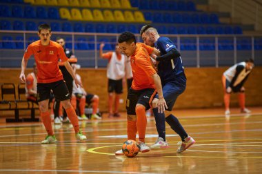 KHARKIV, UKRAINE - 24 Ocak 2021 Ukrayna ExtraLeague Viva Cup Monolit Donbass Energo Trading 'e karşı futsal maçı
