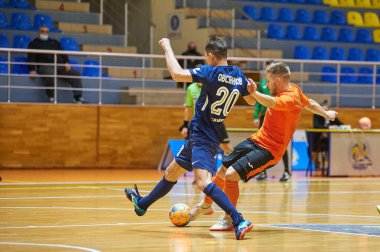 KHARKIV, UKRAINE - 24 Ocak 2021 Ukrayna ExtraLeague Viva Cup Monolit Donbass Energo Trading 'e karşı futsal maçı