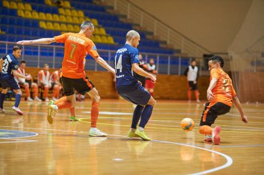 KHARKIV, UKRAINE - 24 Ocak 2021 Ukrayna ExtraLeague Viva Cup Monolit Donbass Energo Trading 'e karşı futsal maçı