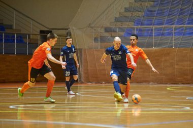 KHARKIV, UKRAINE - 24 Ocak 2021 Ukrayna ExtraLeague Viva Cup Monolit Donbass Energo Trading 'e karşı futsal maçı
