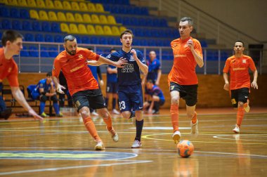 KHARKIV, UKRAINE - 24 Ocak 2021 Ukrayna ExtraLeague Viva Cup Monolit Donbass Energo Trading 'e karşı futsal maçı
