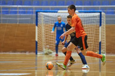 KHARKIV, UKRAINE - 24 Ocak 2021 Ukrayna ExtraLeague Viva Cup Monolit Donbass Energo Trading 'e karşı futsal maçı