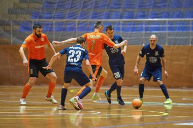 KHARKIV, UKRAINE - 24 Ocak 2021 Ukrayna ExtraLeague Viva Cup Monolit Donbass Energo Trading 'e karşı futsal maçı
