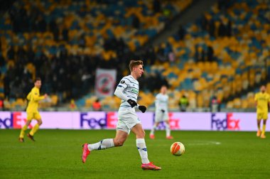 KYIV, UKRAINE - 11 Mart 2021: 25 UEFA Avrupa Ligi Dinamo Kyiv-Villarreal maçı sırasında Kyiv 'deki NSC Olimpiyatları' nda savunma oyuncusu Illia Zabarnyi