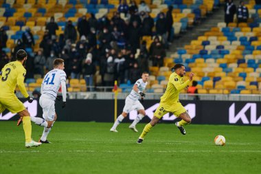 KYIV, UKRAINE - MARCH 11, 2021:25 midfielder Etienne Capoue during the match of UEFA Europa League Dynamo Kyiv vs Villarreal at NSC Olympic in Kyiv