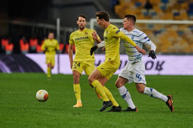 KYIV, UKRAINE - MARCH 11, 2021:4 defender Pau Torres vs 41 forward Artem Besedin during the match of UEFA Europa League Dynamo Kyiv vs Villarreal at NSC Olympic in Kyiv