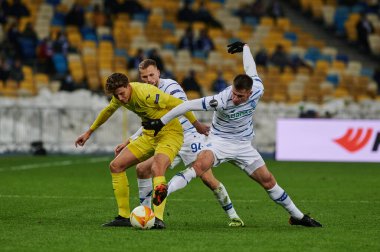 KYIV, UKRAINE - MARCH 11, 2021:4 defender Pau Torres vs 41 forward Artem Besedin and 94 defender Tomasz Kedziora during the match of UEFA Europa League Dynamo Kyiv vs Villarreal at NSC Olympic in Kyiv