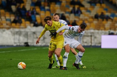 KYIV, UKRAINE - MARCH 11, 2021:4 defender Pau Torres vs 41 forward Artem Besedin and 94 defender Tomasz Kedziora during the match of UEFA Europa League Dynamo Kyiv vs Villarreal at NSC Olympic in Kyiv