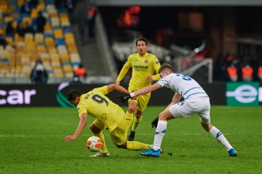 KYIV, UKRAINE - MARCH 11, 2021: 9 forward Carlos Bacca vs 34 defender Oleksandr Syrota during the match of UEFA Europa League Dynamo Kyiv vs Villarreal at NSC Olympic in Kyiv