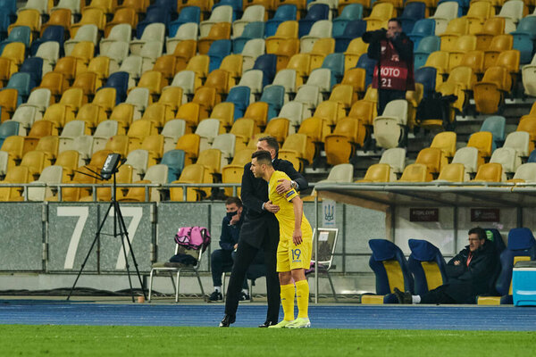 KYIV, UKRAINE - MARCH 28, 2021: coach Andriy Shevchenko and 19 forward Junior Moraes. The football match of Qualifying round Group D of World Cup 2022 Ukraine vs Finland