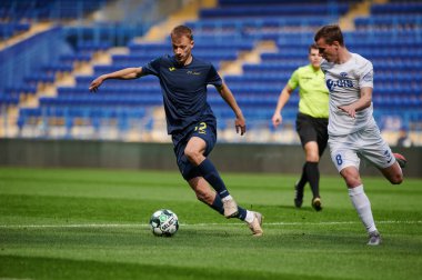 KHARKIV, UKRAINE - 14 Nisan 2021: Profesyonel futbol liginin futbol maçı. FC Metal Harkiv FC Peremoha 'ya karşı