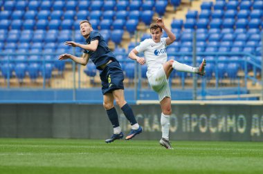 KHARKIV, UKRAINE - 14 Nisan 2021: Profesyonel futbol liginin futbol maçı. FC Metal Harkiv FC Peremoha 'ya karşı