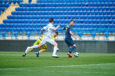 KHARKIV, UKRAINE - 19 Nisan 2021: Ukrayna Profesyonel Lig FC Metal - FC Mykolaiv-2 maçı