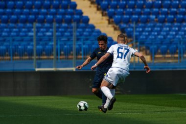 KHARKIV, UKRAINE - 19 Nisan 2021: Ukrayna Profesyonel Lig FC Metal - FC Mykolaiv-2 maçı