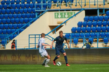KHARKIV, UKRAINE - 19 Nisan 2021: Ukrayna Profesyonel Lig FC Metal - FC Mykolaiv-2 maçı