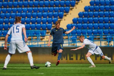 KHARKIV, UKRAINE - 19 Nisan 2021: Ukrayna Profesyonel Lig FC Metal - FC Mykolaiv-2 maçı