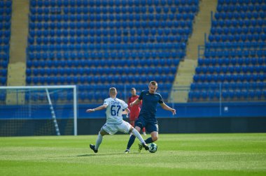 KHARKIV, UKRAINE - 19 Nisan 2021: Ukrayna Profesyonel Lig FC Metal - FC Mykolaiv-2 maçı