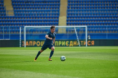 KHARKIV, UKRAINE - 19 Nisan 2021: Ukrayna Profesyonel Lig FC Metal - FC Mykolaiv-2 maçı