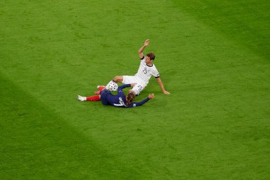MUNICH, GERMANY - 15 Haziran 2021: Antoine Griezmann (7) - Thomas Muller (25) EURO 2020. Fransa Almanya 'ya karşı futbol maçı