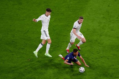 MUNİH, GERMANY - 15 Haziran 2021: Raphael Varane (4) - Kai Havertz (7) ve Robin Gosens (20) EURO 2020. Fransa Almanya 'ya karşı futbol maçı