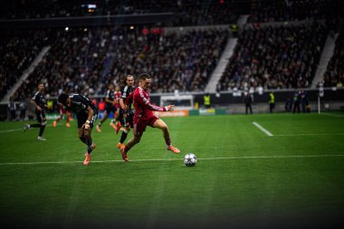 FRANKFURT, GERMANY - 22 OCTOBER, 2025: Florian Wirtz, Nathaniel Brown - UEFA Şampiyonlar Ligi, maç SG Eintracht-Liverpool FC Deutsche Park 'ta.