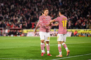 COLOGNE, GERMANY - 2 NOVEMBER, 2025: Sebastian Sebulonsen, Jakub Kaminski - Bundesliga 1.FC Koeln-Hamburger SV maçı Rhein Energie Stadion 'da.