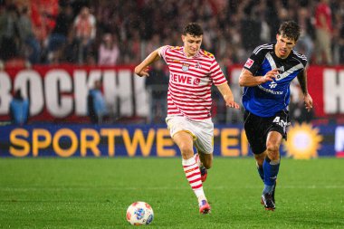 COLOGNE, GERMANY - 2 Kasım 2025: Eric Martel, Hannes Hermann - Bundesliga 1.FC Koeln-Hamburger SV maçı Rhein Energie Stadion 'da.