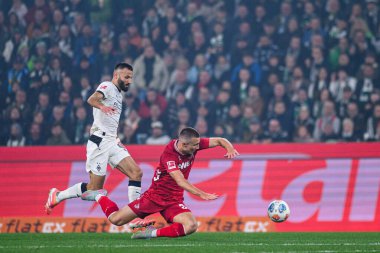 MOENCHENGLADBACH, GERMANY - 8 NOVEMBER, 2025: Kristoffer Lund, Franck Honorat - Bundesliga Borussia Moenchengladbach - 1. FC Koeln Borussia Parkı 'nda. 