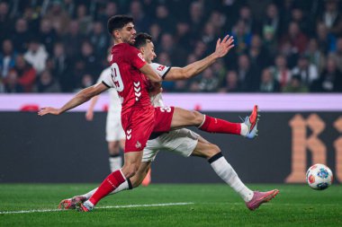 MOENCHENGLADBACH, GERMANY - 8 NOVEMBER, 2025: Cenk Oezkacar, Haris Tabakovic - Bundesliga Borussia Moenchengladbach - 1. FC Koeln Borussia Parkı 'nda. 