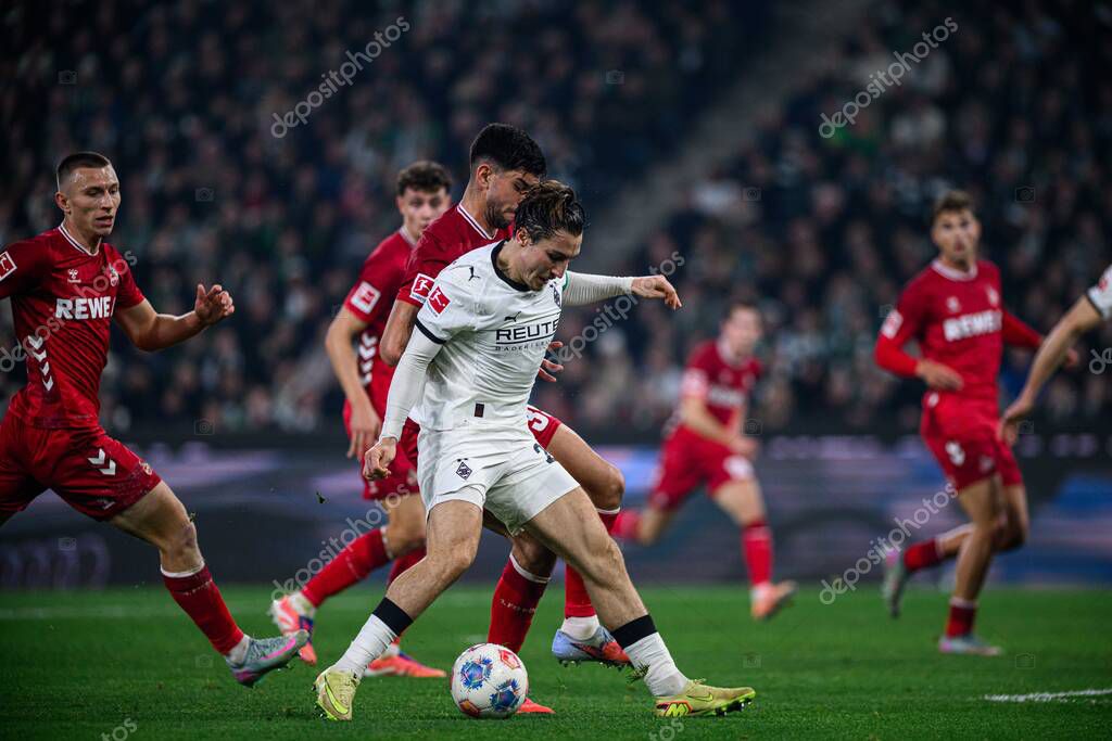 MOENCHENGLADBACH, GERMANY - 8 NOVEMBER, 2025: Rocco Reitz, Cenk Oezkacar - The football match of Bundesliga Borussia Moenchengladbach vs 1. FC Koeln at Borussia Park.