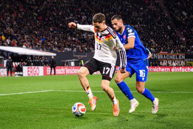 LEIPZIG, GERMANY - 17 Kasım 2025: Florian Wirtz, David Hancko - Dünya Kupası eleme karşılaşması Almanya ile Slovakya arasında Red Bull Arena 'da.