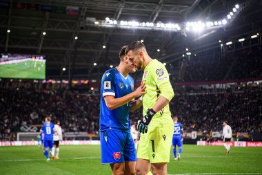 LEIPZIG, GERMANY - 17 Kasım 2025: Adam Obert, Martin Dubravka - Dünya Kupası eleme karşılaşması Almanya ile Slovakya arasında Red Bull Arena 'da.