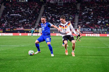 LEIPZIG, GERMANY - 17 Kasım 2025: Florian Wirtz, Stanislav Lobotka - Dünya Kupası 2026 ön eleme karşılaşması Almanya ile Slovakya arasında Red Bull Arena 'da.