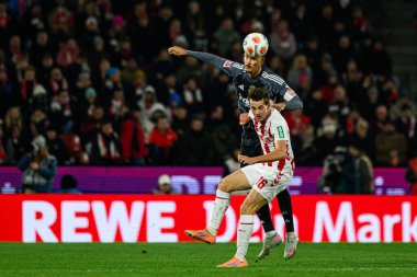 COLOGNE, GERMANY - 22 NOVEMBER, 2025: Robin Koch, Jakub Kaminski - Bundesliga 1.FC Koeln-SG Eintracht Frankfurt maçı Rhein Energie Stadion 'da.