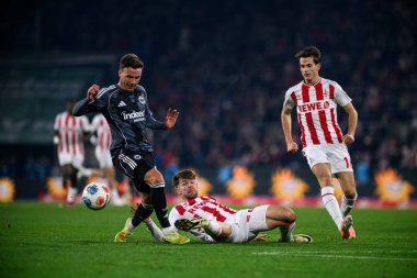 COLOGNE, GERMANY - 22 NOVEMBER, 2025: Mario Gotze, Jan Thielmann - Bundesliga 1.FC Koeln-SG Eintracht Frankfurt maçı Rhein Enerji Stadyumu 'nda.