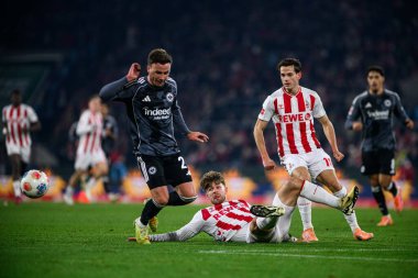COLOGNE, GERMANY - 22 NOVEMBER, 2025: Mario Gotze, Jan Thielmann - Bundesliga 1.FC Koeln-SG Eintracht Frankfurt maçı Rhein Enerji Stadyumu 'nda.