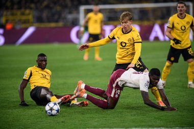 DORTMUND, GERMANY - 25 NOVEMBER, 2025: Serhou Guirassy, Nicolas Pepe, Daniel Svensson - UEFA Şampiyonlar Ligi maçı Borussia Dortmund vs Villarreal CF.