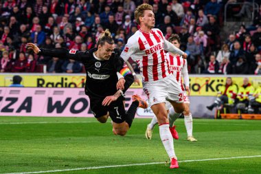 COLOGNE, GERMANY - 6 Aralık 2025: Jackson Irvine, Sebastian Sebulonsen - Bundesliga 1.FC Koeln-St. Pauli maçı.