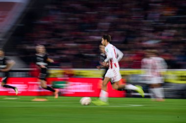 COLOGNE, GERMANY - 6 ARALIK, 2025: Denis Huseinbas- 1.FC Koeln-St. Pauli futbol maçı Rhein Enerji Stadyumu 'nda.