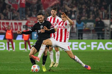 COLOGNE, GERMANY - 6 Aralık 2025: Mathias Pereira Lage, Eric Martel - Bundesliga 1.FC Koeln-St. Pauli maçı.