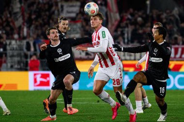 COLOGNE, GERMANY - 6 Aralık 2025: Connor Metcalfe, Sebastian Sebulonsen - Bundesliga 1.FC Koeln-St. Pauli maçı Rhein Energie Stadion 'da.
