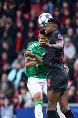 LEVERKUSEN, GERMANY - 10 Aralık 2025: Edmond Tapsoba, Malick Thiaw - UEFA Şampiyonlar Ligi, Bayer 04 Leverkusen-Newcastle United maçında.