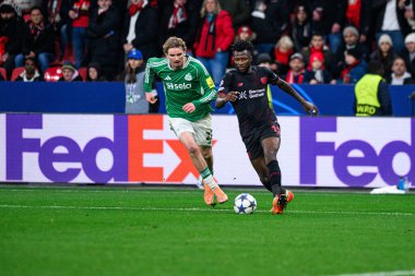 LEVERKUSEN, GERMANY - 10 ARALIK, 2025: Nick Woltebari Edmond Tapsoba - UEFA Şampiyonlar Ligi, Bayer 04 Leverkusen-Newcastle United maçı Bayena 'da.
