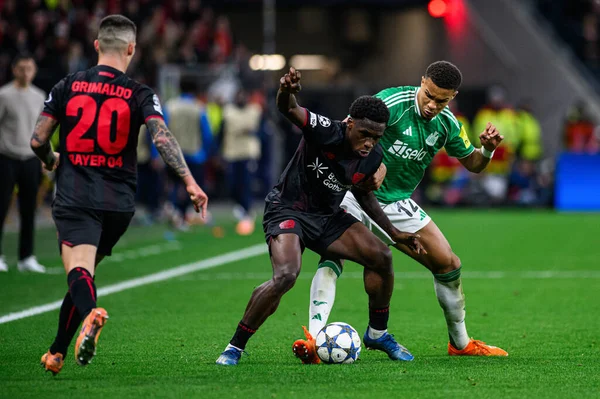 LEVERKUSEN, GERMANY - 10 ARALIK, 2025: Ernest Poku, Malick Thiaw - UEFA Şampiyonlar Ligi, Bayer 04 Leverkusen - Newcastle United.