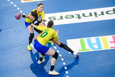 DORTMUND, GERMANY - 9 Aralık 2025: Annika Lott, Clausson Bitolo Gabriela, Fais Munhoz Araujo Larissa - Kadınlar Hentbol Dünya Şampiyonası 2025 Almanya - Westfallenhalle 'de Brezilya' ya karşı.
