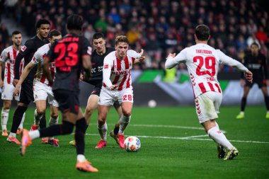 LEVERKUSEN, GERMANY - 13 ARALIK 2025: Sebastian Sebulonsen, İbrahim Maza, Eric Martel - Bundesliga maçı Bayer 04 Leverkusen - Bayarena 'da 1.FC Koeln' e karşı.
