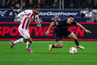 LEVERKUSEN, GERMANY - 13 ARALIK, 2025: İbrahim Maza, Linton Maina - Bundesliga maçı Bayer 04 Leverkusen 'e karşı Bayena' da 1.FC Koeln.