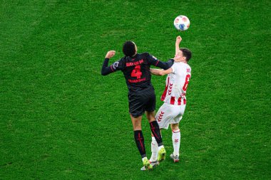 LEVERKUSEN, GERMANY - 13 ARALIK 2025: Jarell Quansah, Eric Martel - Bundesliga maçı Bayer 04 Leverkusen 'e karşı Bayena' da 1.FC Koeln.
